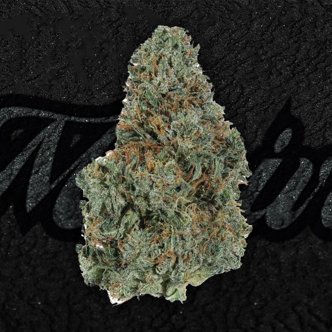 Kush Mints cannabis flower close-up showing frosty green buds with purple hues and orange pistils. Known for its creamy mint aroma, gassy flavor, and relaxing hybrid effects.